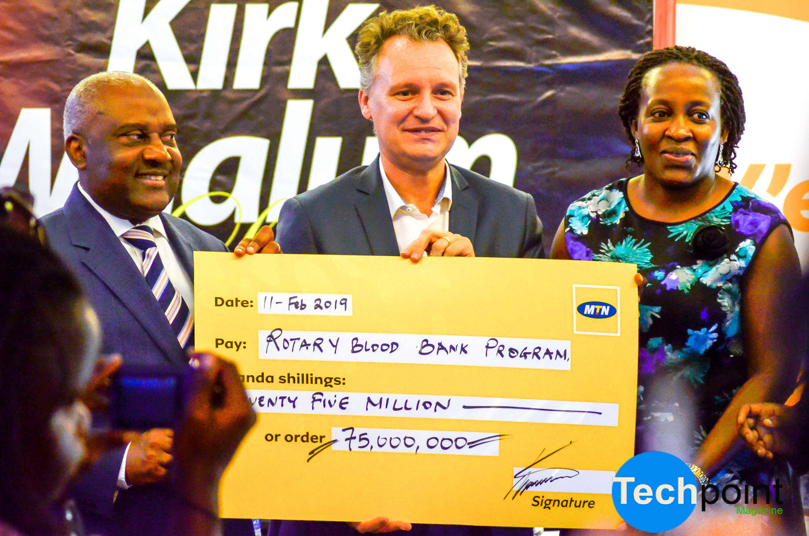 MTN CEO Wim Hands over a cheque to the Rotary blood Bank